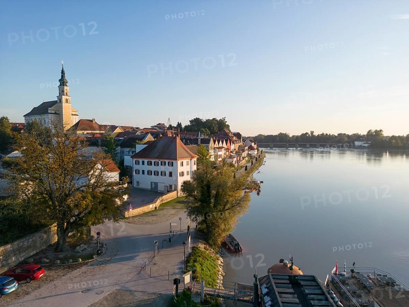 Riverbank promenade and town aerial view