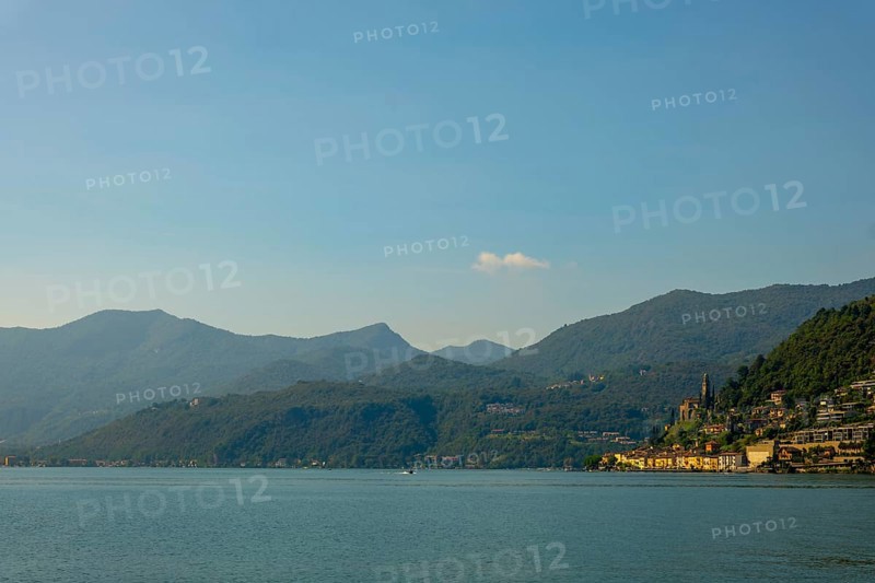 Lake and Mountain View over Morcote in a Sunny Summer Day on Lake Lugano in Morcote