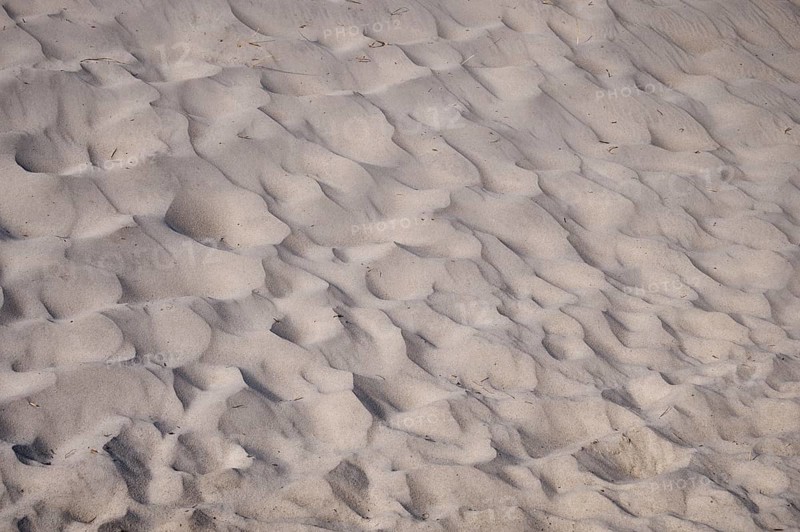 Waves in the sand on the beach near Henne Strand