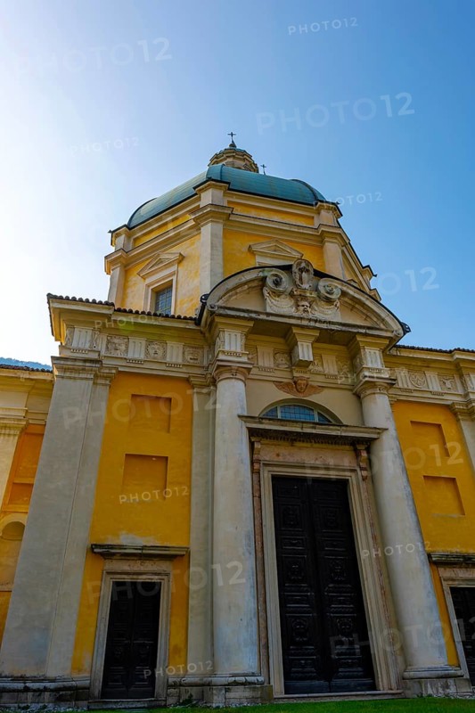 Temple of the Holy Cross Against Blue Clear Sky in a Sunny Day in Riva San Vitale
