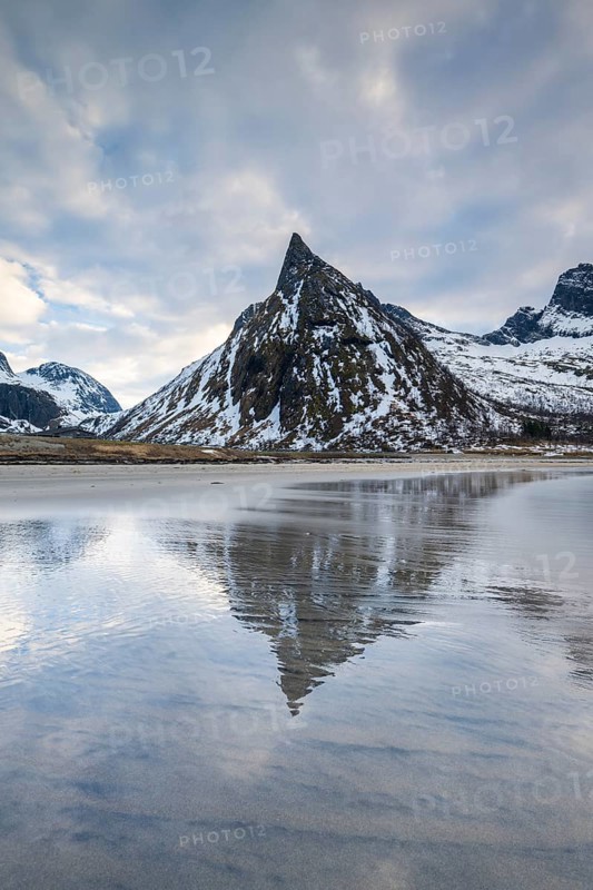 Mount Hatten reflected on the beach