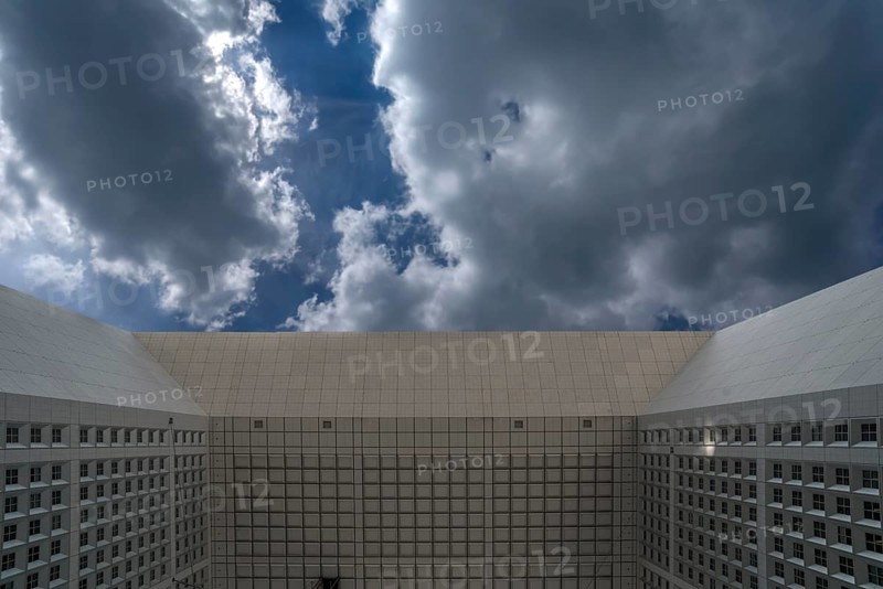 Cloudy sky and underside of the roof of the Grand Arche