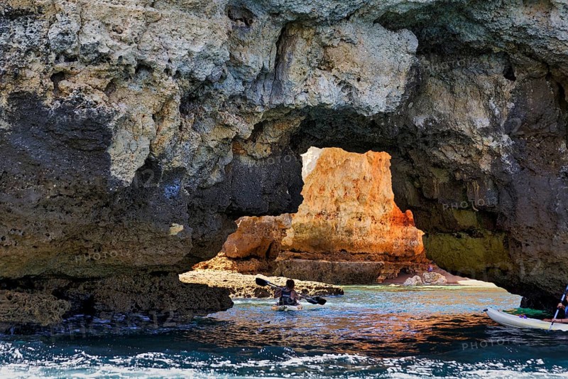 Tourists kayaking at Ponta da Piedade