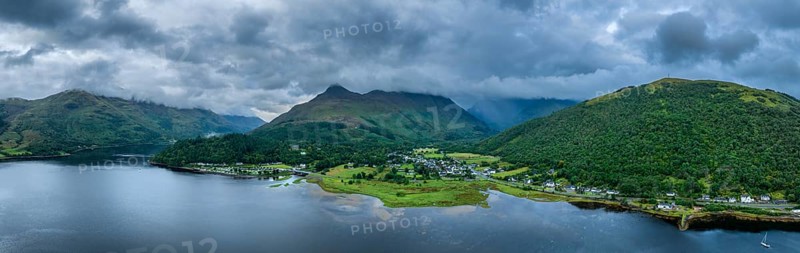 Aerial panorama of the freshwater loch Loch Leven with the village of Glen Coe