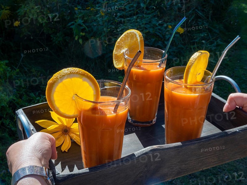 Freshly squeezed juice in juice glasses