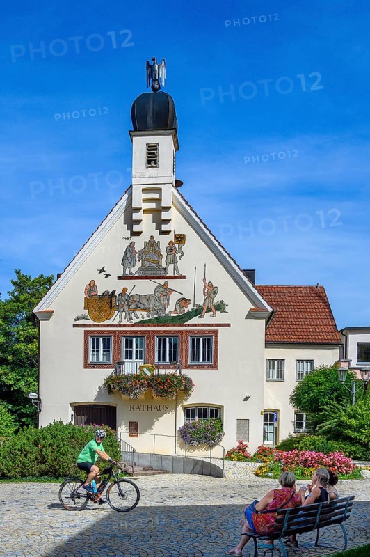 The town hall with cyclist