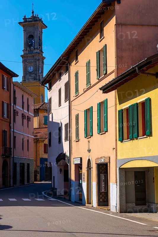 City of Porto Ceresio and Church Tower in a Sunny Summer Day in Porto Ceresio