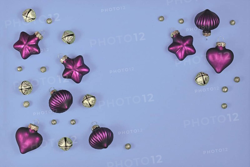 Christmas flat lay with purple tree ornament baubles