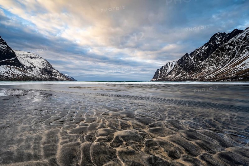 Sandy beach beach with mountains