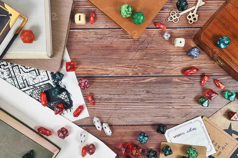 Tabletop role playing flat lay background with colorful RPG dices