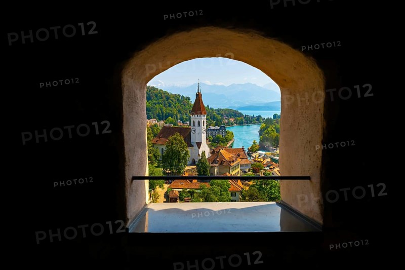 WindowView over City of Thun and Lake with Mountain in a Sunny Day in Thun