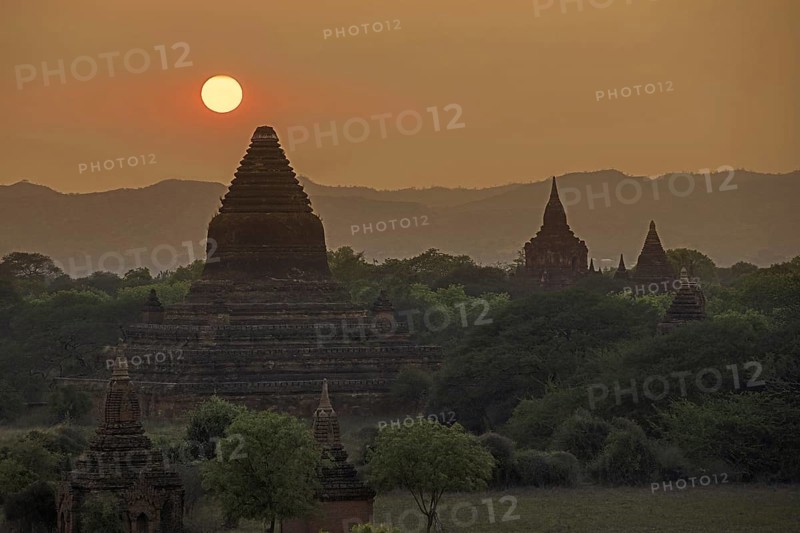 Buddhist temples and pagodas at sunset in the ancient city Bagan
