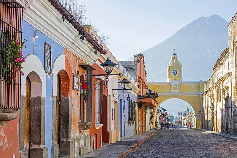 Colourful colonial houses and the 17th century Arco de Santa Catalina Arch in the city Antigua Guatemala