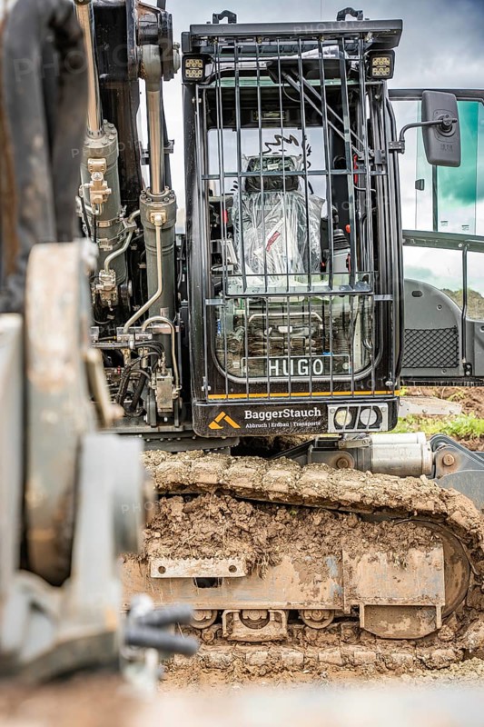Black Liebherr crawler excavator recycling on demolition site