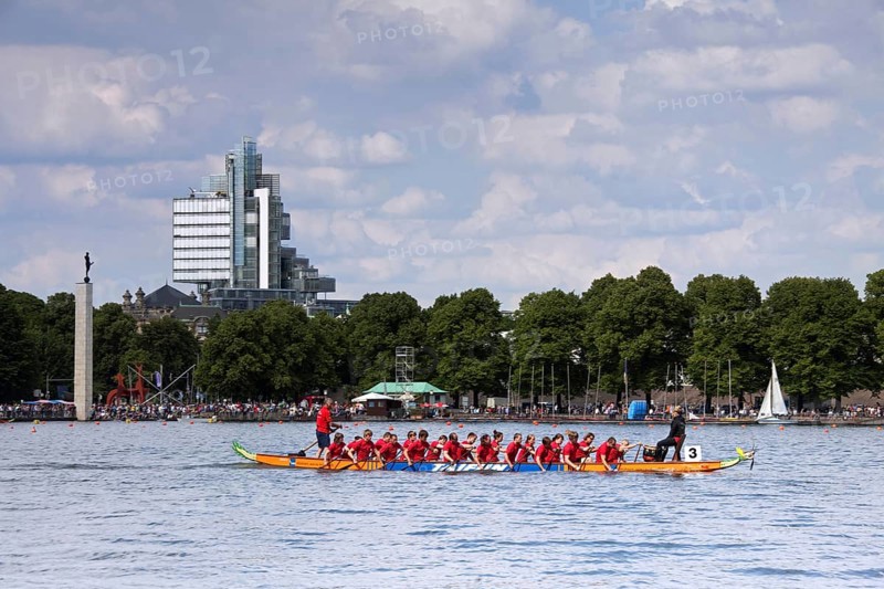 Dragonboat race on the artificial lake Maschsee and the Norddeutsche Landesbank in the background