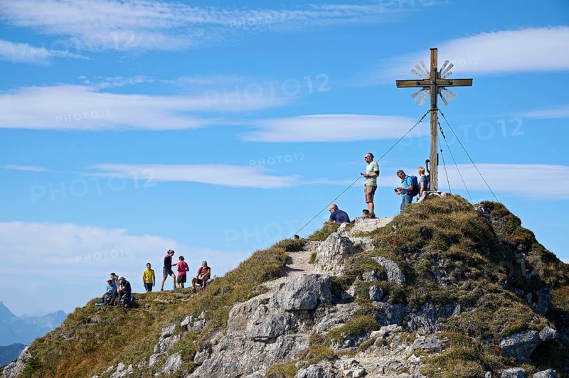 Hiker at the summit of the Grosse Klammspitze