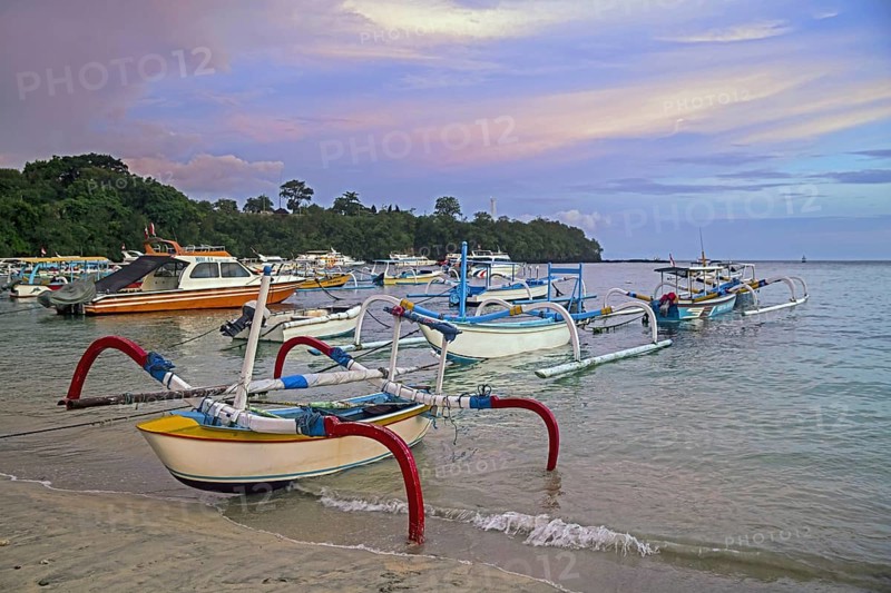 Traditional outrigger fishing boats on the beach at Padang Bai