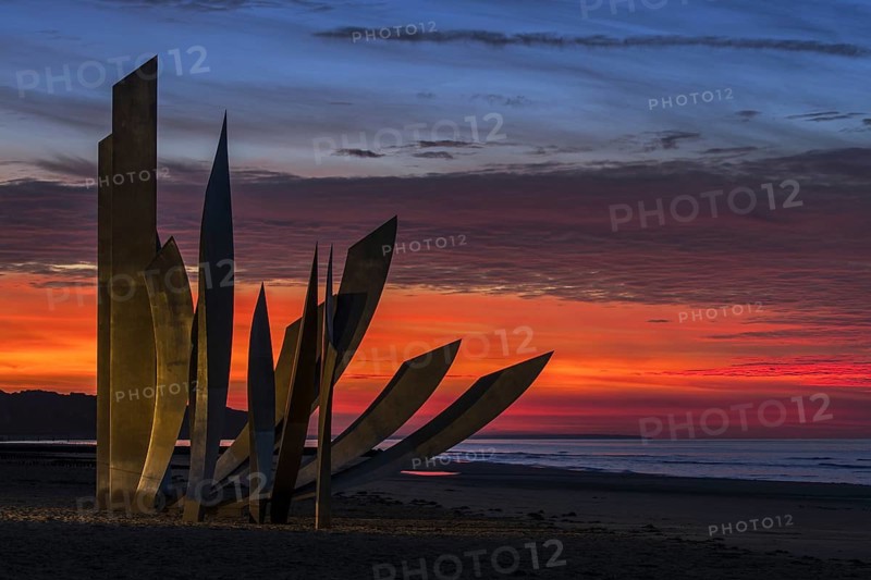 Second World War Two Omaha Beach monument Les Braves at Saint-Laurent-sur-Mer at sunset
