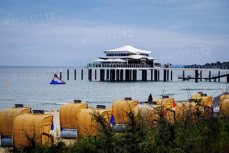 Pier in Timmendorf on the Baltic Sea with gastronomy. Hanseatic City of Luebeck