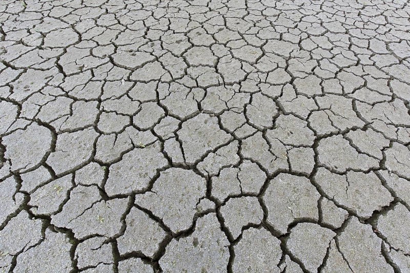 Abstract pattern of dry cracked clay mud in dried up lake bed