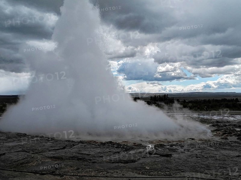 The geyser Stokkur in the hot water valley Haukadalur in the municipality of Blaskogabyggd in the south of Iceland