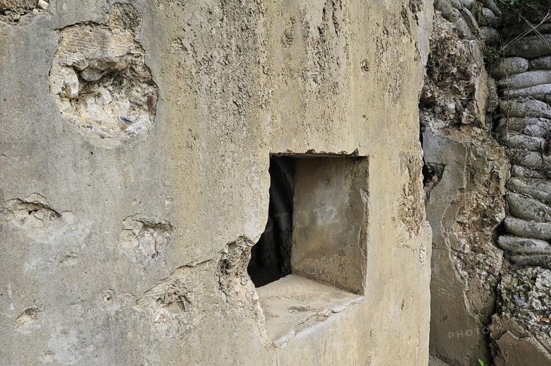 Bullet holes in one of the four British bunkers as headquarters on the Lettenberg
