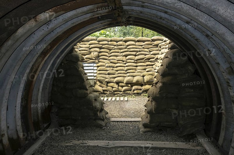 Reconstruction of British First World War One Baby Elephant shelter made of sheets of corrugated iron in trench at Zonnebeke