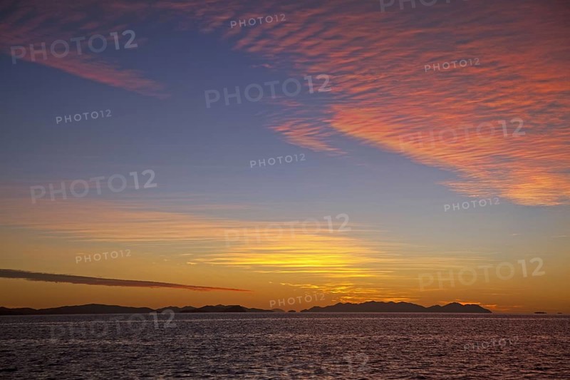 Mackerel sunset over the Whitsunday Islands in the Coral Sea