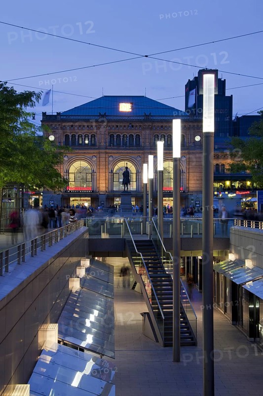 The Niki-de-Saint-Phalle-Promenade leading to the Central railway station in Hannover at sunset
