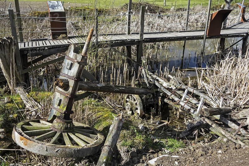 Broken cart and duckboard over flooded terrain at The IJzertoren