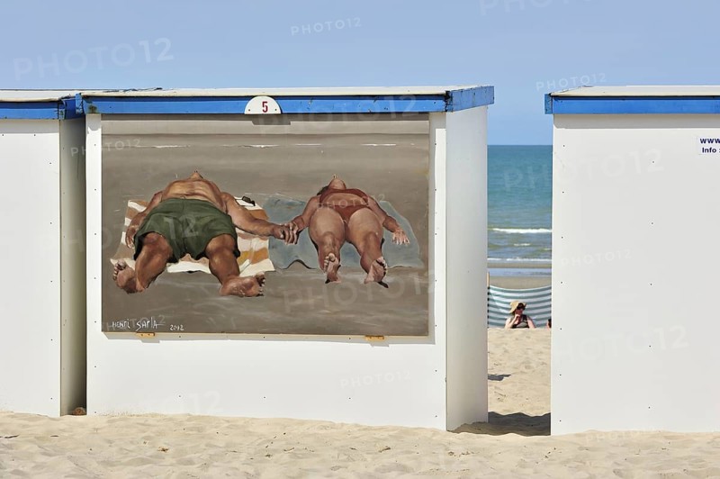 Wall painting of sunbathers on beach cabin along the North Sea coast at Koksijde