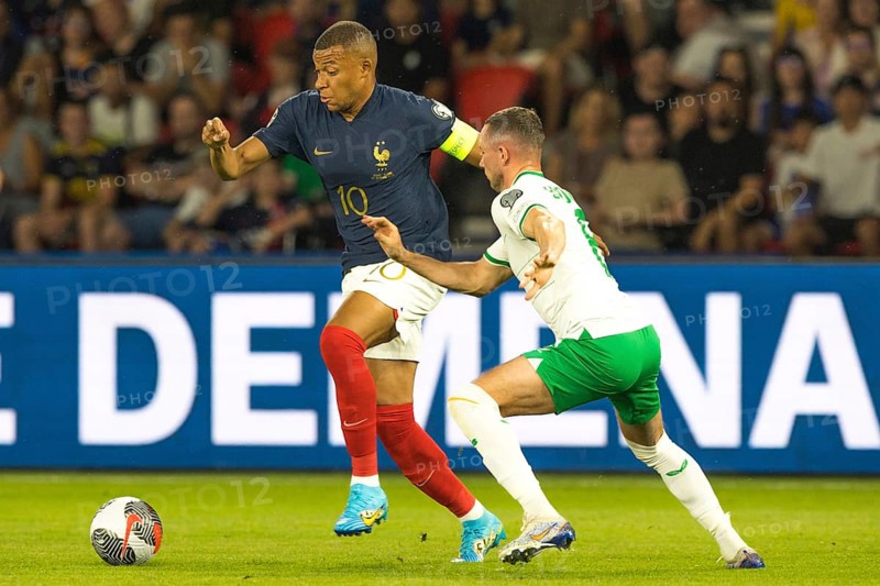 Kylian MBAPPE France left in duel with Alan BROWNE Ireland