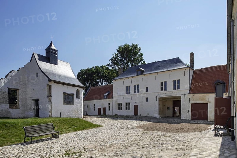 Courtyard showing chapel and gardener s house of the Chateau d'Hougoumont