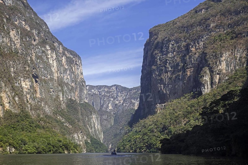 Motorboat with tourists on the Grijalva River in the Sumidero Canyon National Park near Chiapa de Corzo