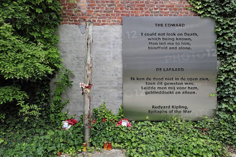 World War One execution pole and epitaph The Coward by Rudyard Kipling at inner courtyard of the Poperinge town hall