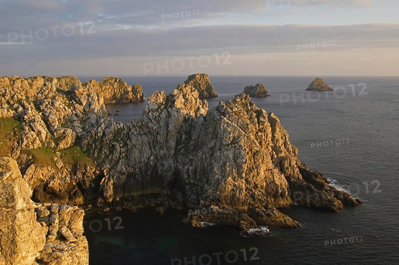 Sea cliffs at sunset at the Pointe de Pen-Hir