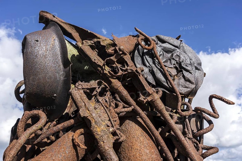 Compressed and twisted metal of WWI remnants like rifles