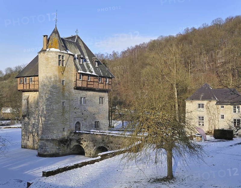 13th Century keep of Castle Carondelet at Crupet in the snow in winter