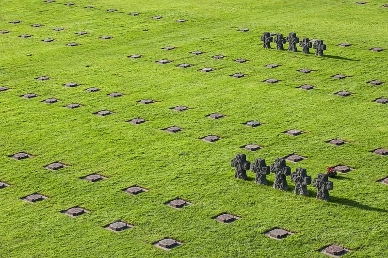 Tombstones and stone crosses at La Cambe German Second World War military cemetery