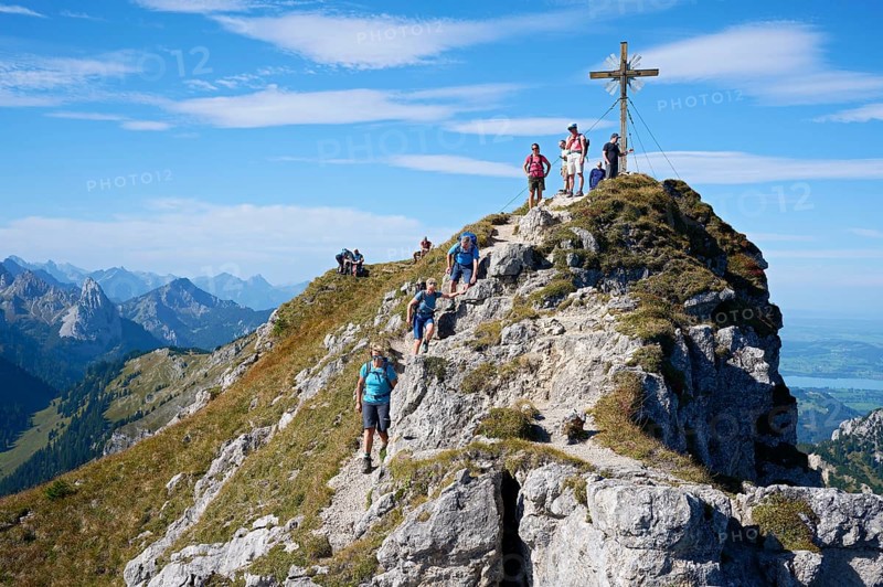 Hiker at the summit of the Grosse Klammspitze