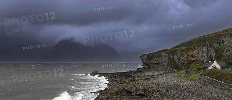 Rain clouds at sunset over the Cuillin Hills