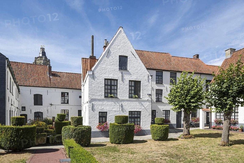 White beguines' houses in courtyard of the Beguinage of Oudenaarde