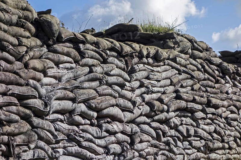 Wall of stacked sandbags in WWI trench used as defence in First World War One warfare