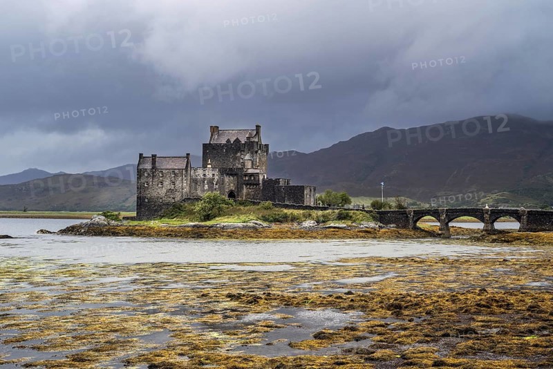 Eilean Donan Castle in Loch Duich during rain shower