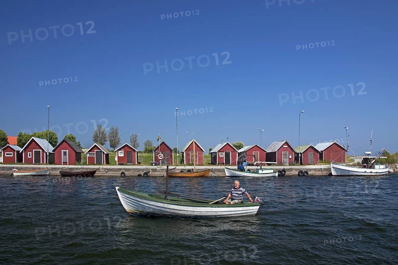 Fisherman in boat at the fishing village Kappelshamn