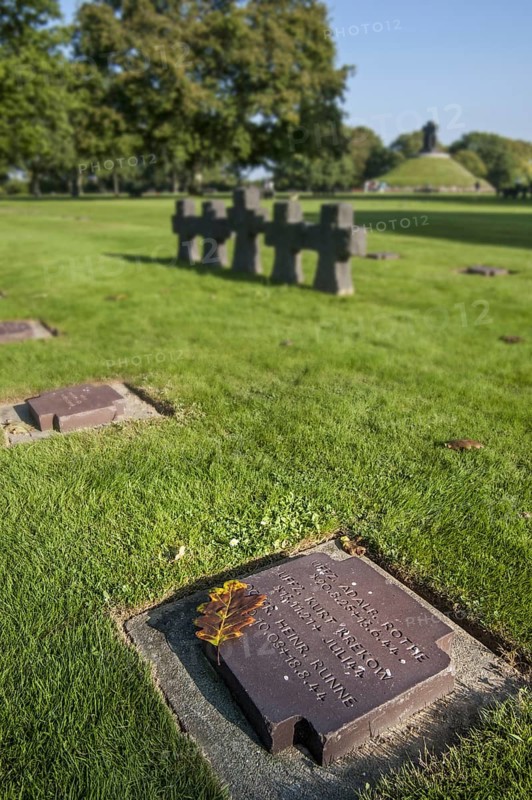 Tombstones and stone crosses at La Cambe German Second World War military cemetery
