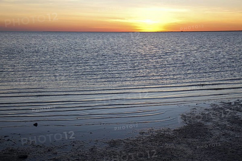 Sunset over Makgadikgadi Salt pan in the Kalahari desert in Botswana