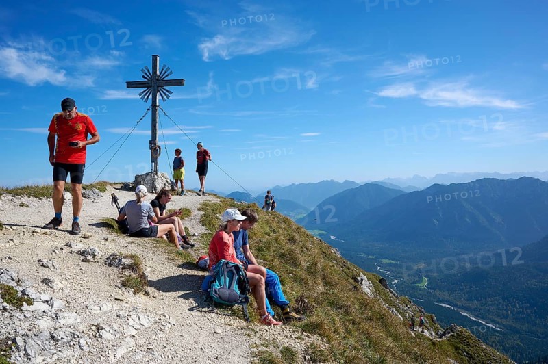 Hiker at the summit of the Grosse Klammspitze