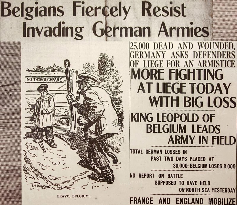 WWI newspaper article with cartoon in English paper reporting news about the First World War One front in Belgium