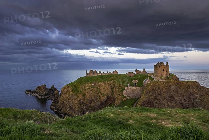 Menacing dark clouds above Dunnottar Castle